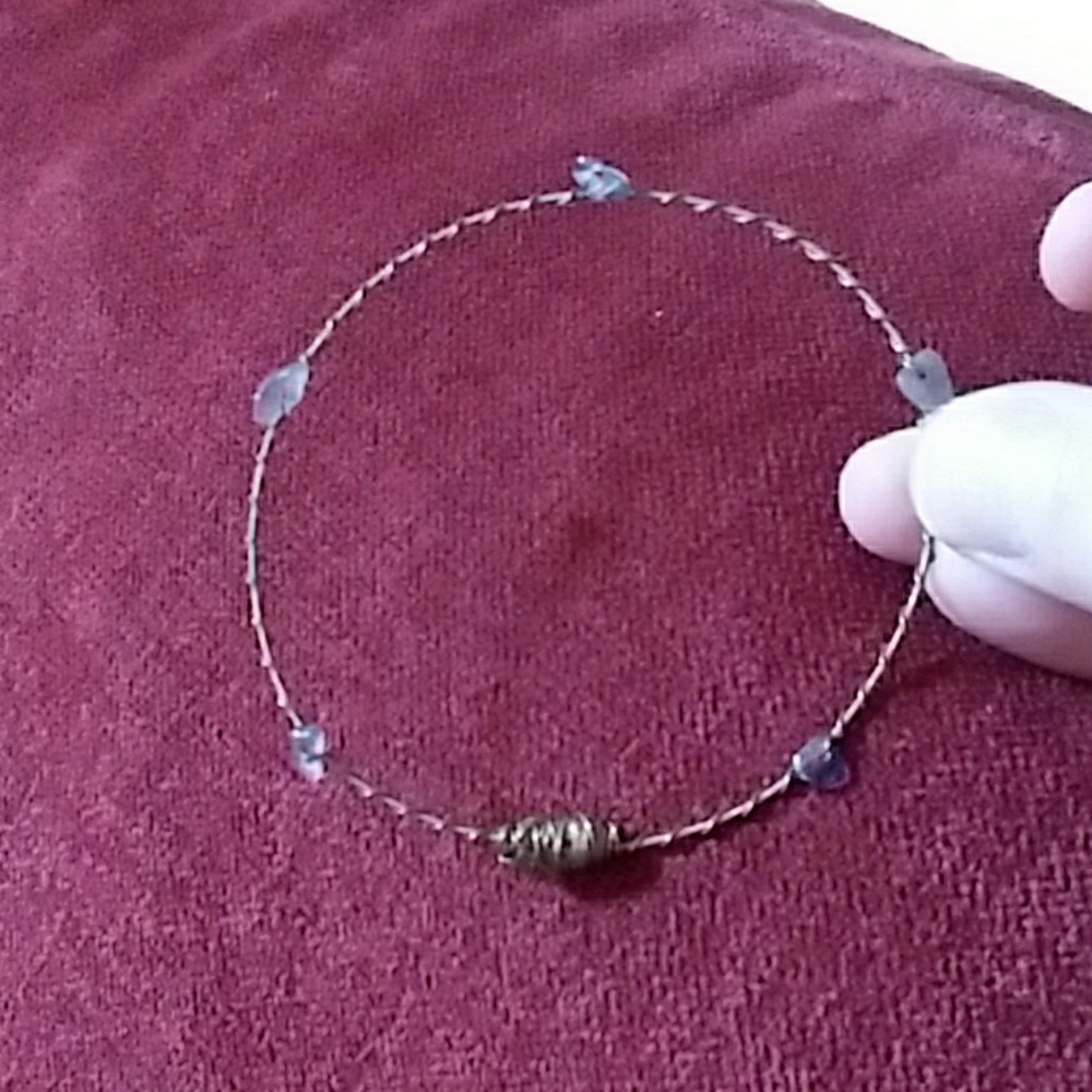 Bracelet made from guitar strings and amethyst